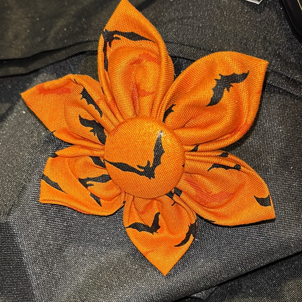 Orange with black Bat Flower bow for dogs they are 3-1/2” wide with Velcro back